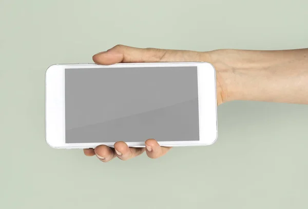 Telefone inteligente na mão humana — Fotografia de Stock