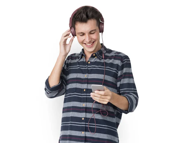 Young man in headphones — Stock Photo, Image