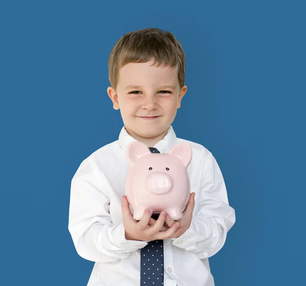 Rapaz segurando piggybank — Fotografia de Stock