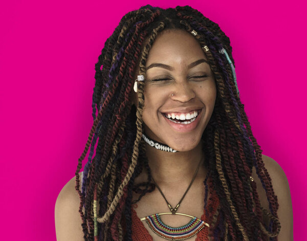 african woman with dreadlocks laughing