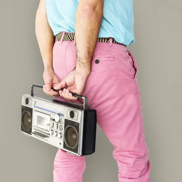 Man in pink trousers holding boombox — Stock Photo, Image