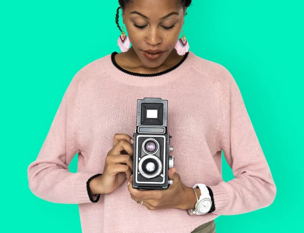 Woman holding two lens camera — Stock Photo, Image