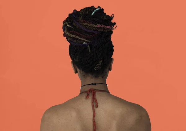 back view of African woman with dreadlocks