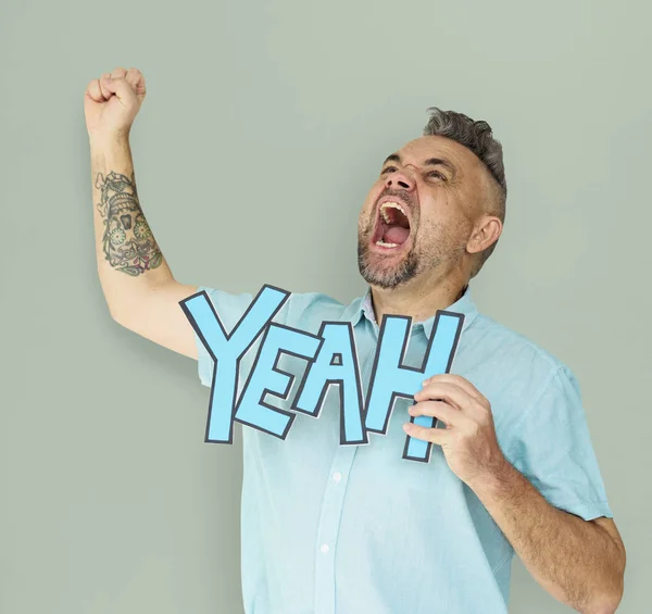 Man holding letters YEAH — Stock Photo, Image