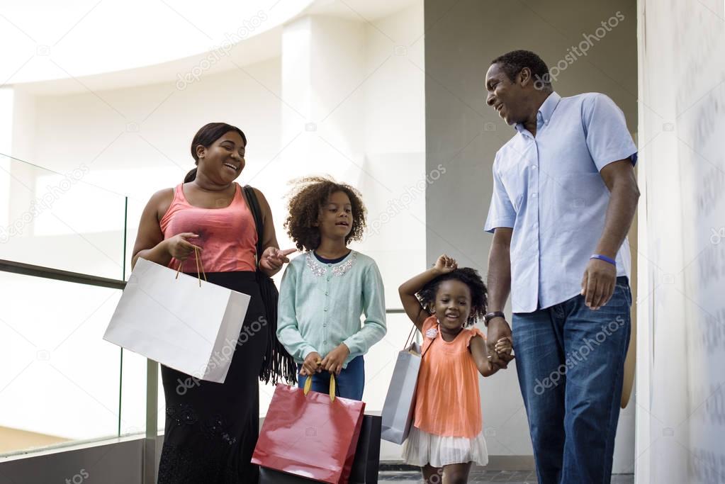 African Family with shopping bags