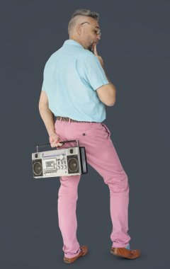 adam holding boombox