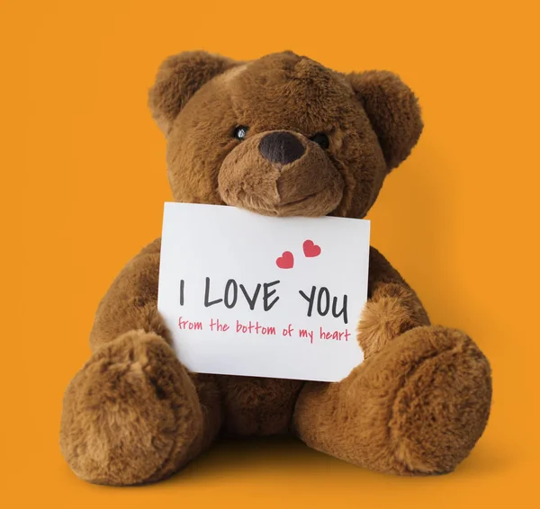 Nallebjörn med valentine kort — Stockfoto