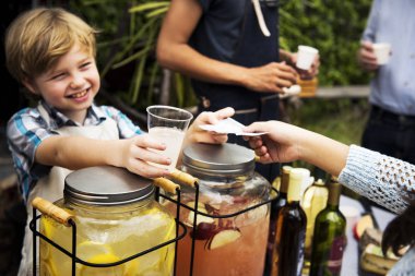 boy selling lemonade clipart