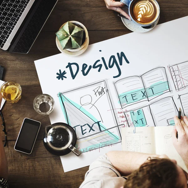 Mesa con póster con concepto de diseño — Foto de Stock