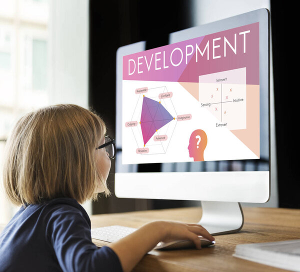 little girl using computer