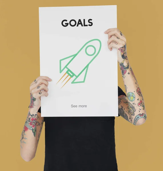 Woman with tattoos holding placard — Stock Photo, Image