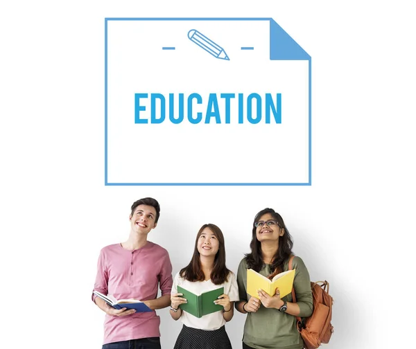 Students standing and holding books — Stock Photo, Image
