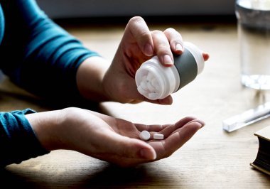 kadın alarak Vitamin hapı