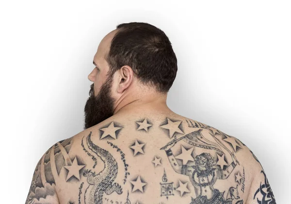Człowiek z tatuażem na plecach — Zdjęcie stockowe