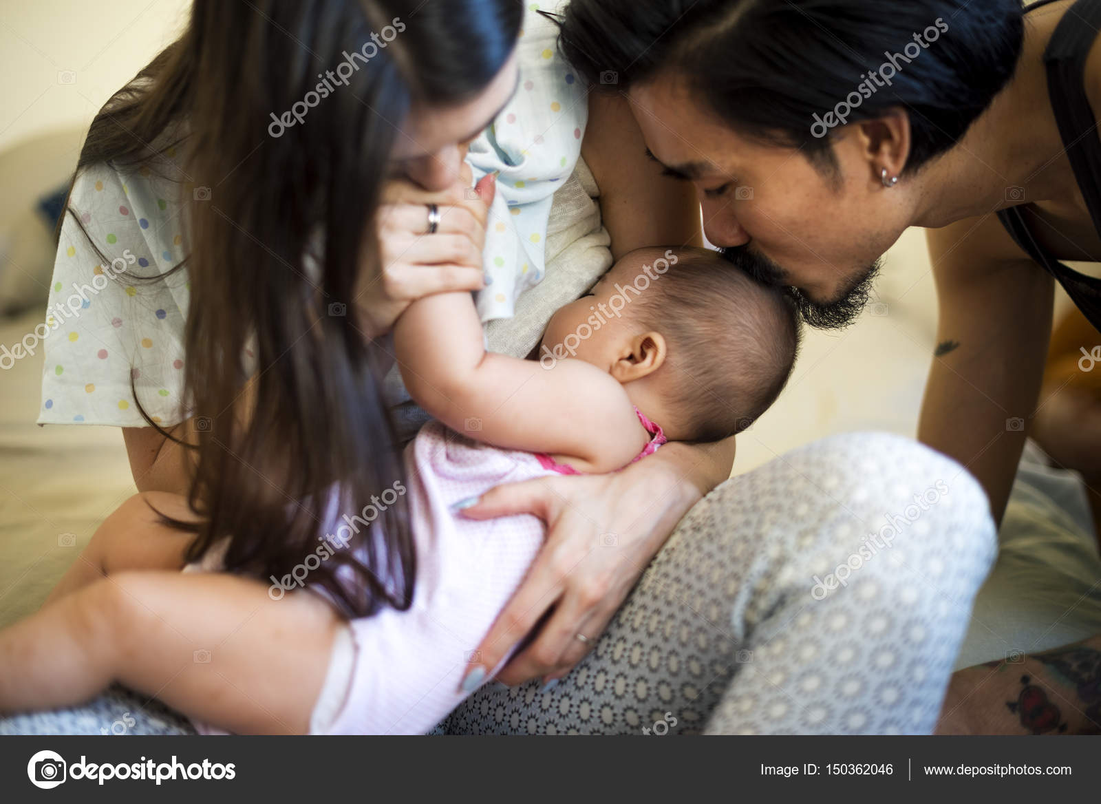 Parents Kissing Sleeping Baby Stock Photo By C Rawpixel