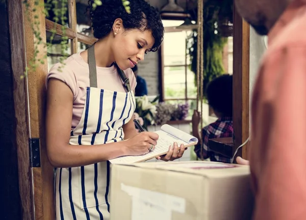 Man Deliver Mail Box to Woman