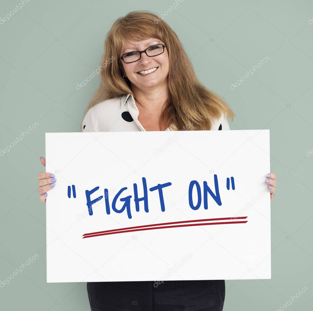  woman holding placard 