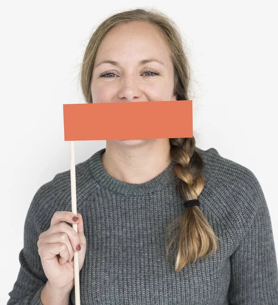 Woman holding paper blank — Stock Photo, Image