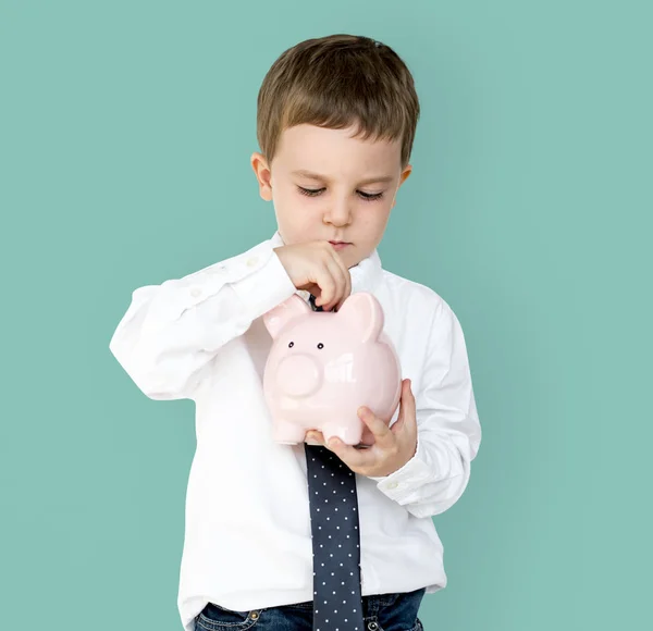 Rapaz segurando piggybank — Fotografia de Stock