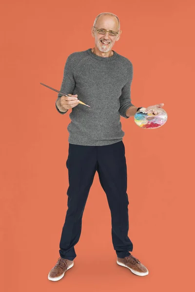 Renk paleti ile üst düzey yetişkin adam — Stok fotoğraf