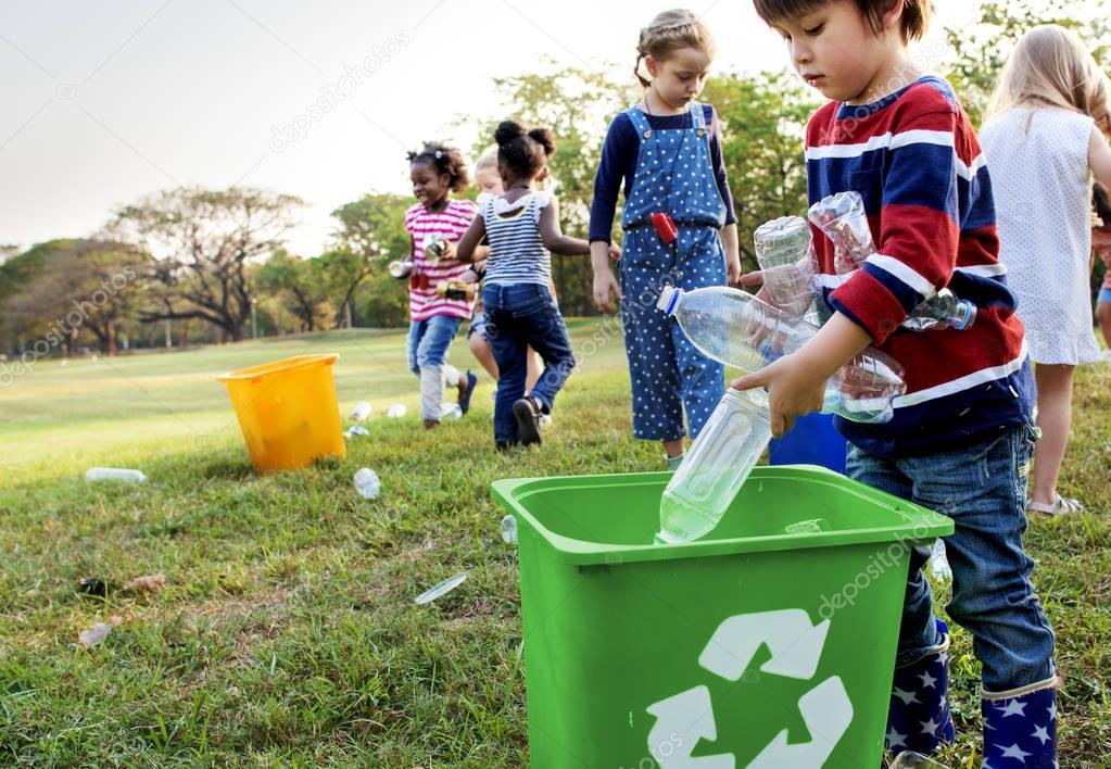 kindergarten kids cleaning garbage 