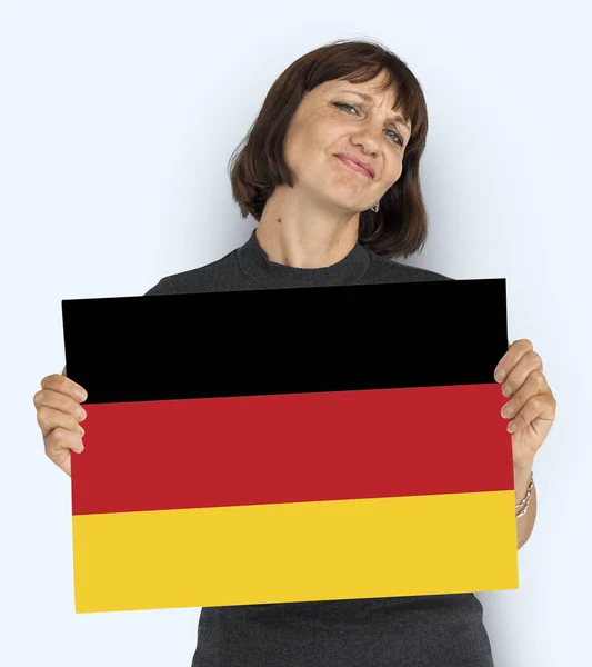Adult woman holding placard — Stock Photo, Image