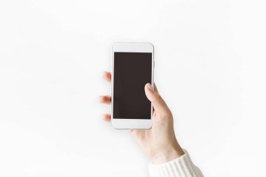 El ele tutuşan cep telefonu