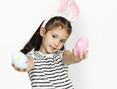 cute little girl with easter eggs