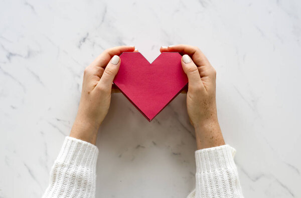 woman Holding red heart