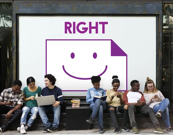 Young students siting near placard — Stock Photo, Image