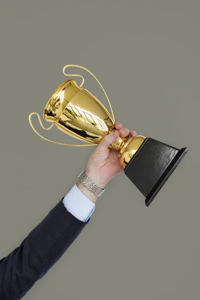 Businessman Holding golden Trophy — Stock Photo, Image