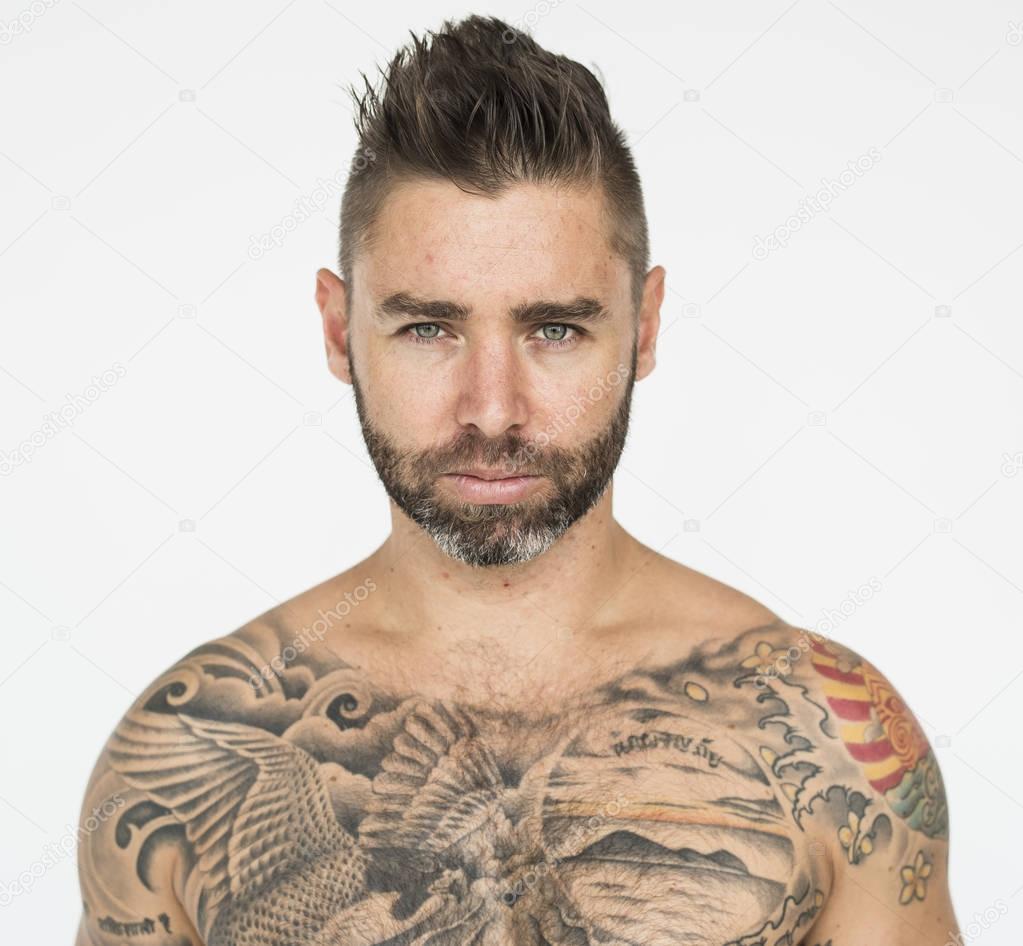 shirtless tattooed man 