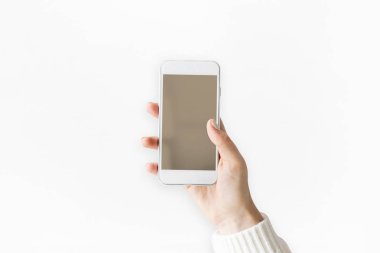 El ele tutuşan cep telefonu