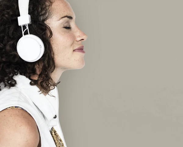 Curly hair woman with headphones — Stock Photo, Image