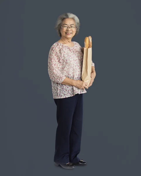 Mulher segurando Baguettes — Fotografia de Stock