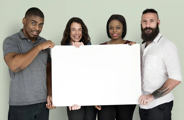 people holding blank banner