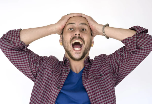 Man holding head and screaming — Stock Photo, Image