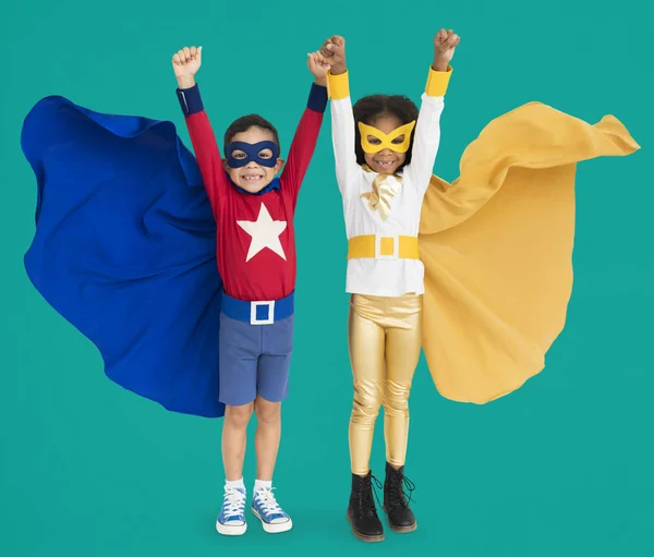 Очаровательные дети в костюмах супергероев — стоковое фото