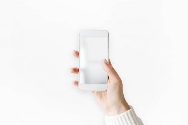 El ele tutuşan cep telefonu