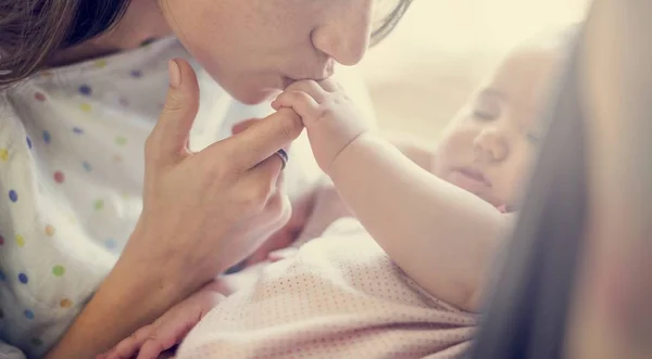 Mother taking care of baby — Stock Photo, Image