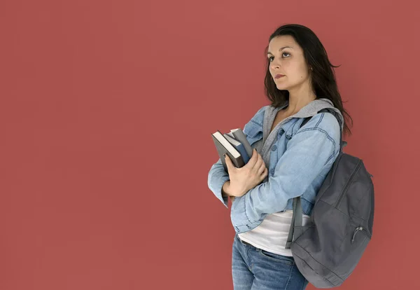 Chica estudiante llevando libros — Foto de Stock