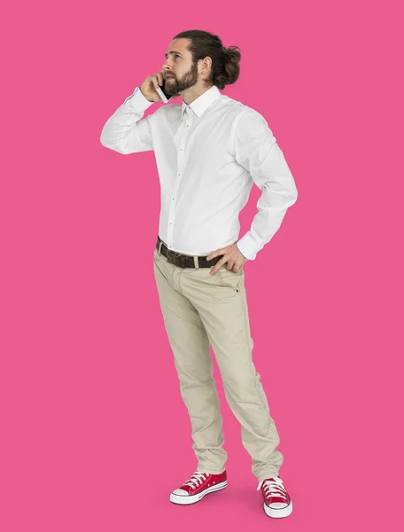 Bearded man talking on mobile — Stock Photo, Image