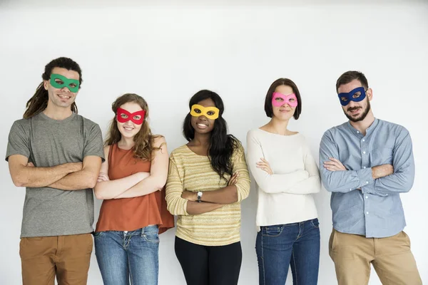 Pessoas usando máscaras de super-heróis — Fotografia de Stock