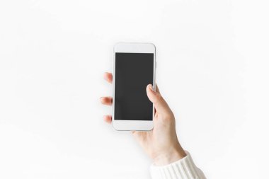 El ele tutuşan cep telefonu