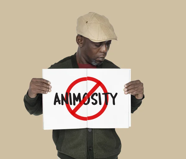 Adult African man holding placard — Stock Photo, Image