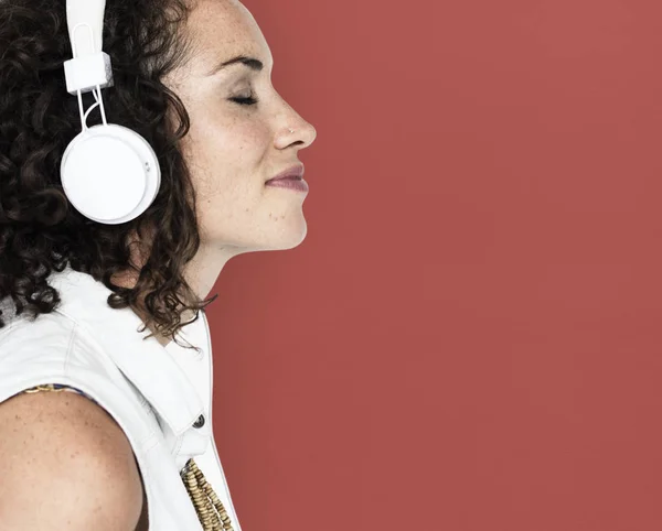 Curly hair woman with headphones — Stock Photo, Image