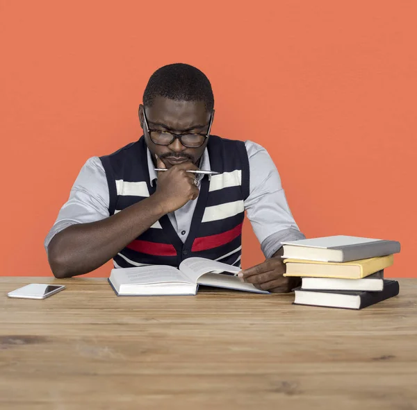 Black ethnicity man reading books — Stock Photo, Image