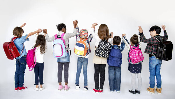 school children with backpacks 