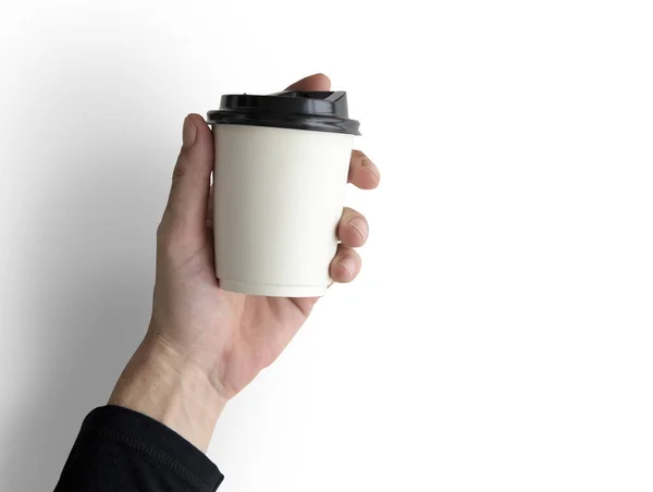 Mão humana segurando caneca de café — Fotografia de Stock