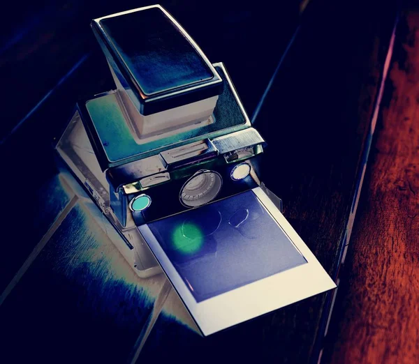 Vintage instant photo camera — Stock Photo, Image